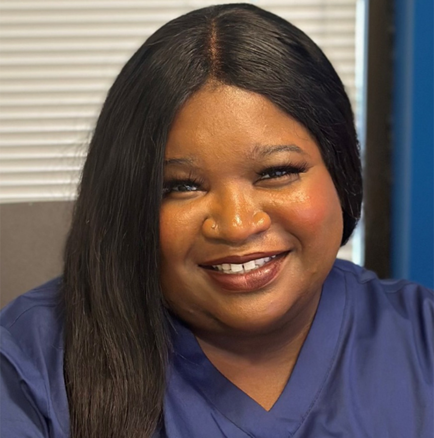 Black woman smiling at camera