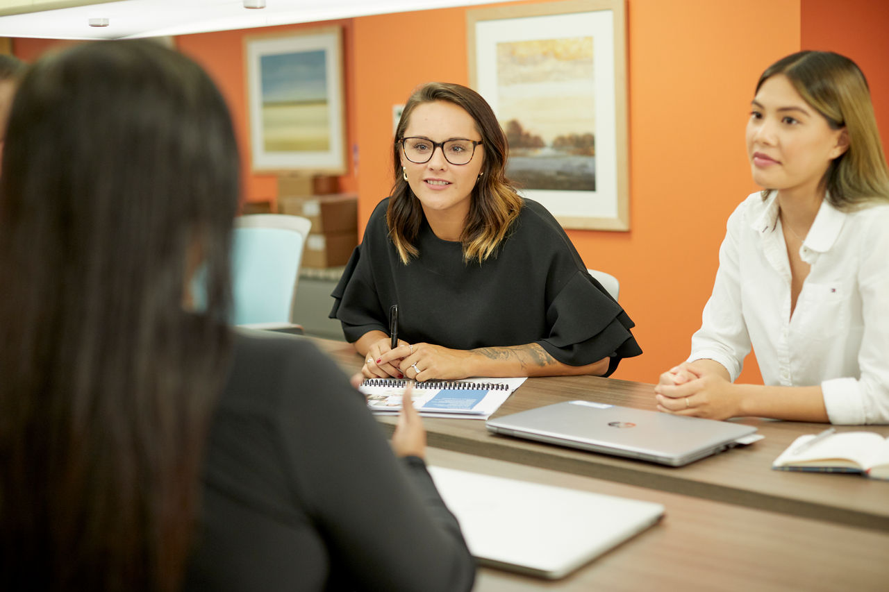 Two women at desk