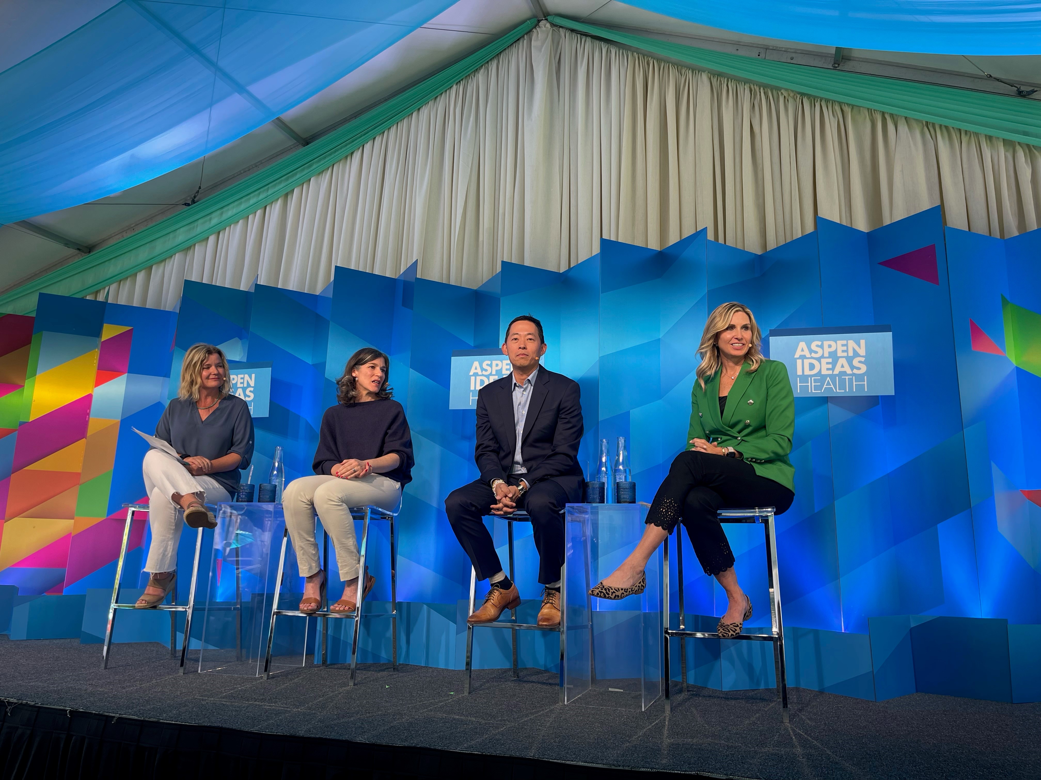 picture of Kristen Duffey onstage at a panel discussion for Aspen Health
