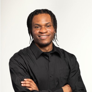 Male in black shirt posing for photo
