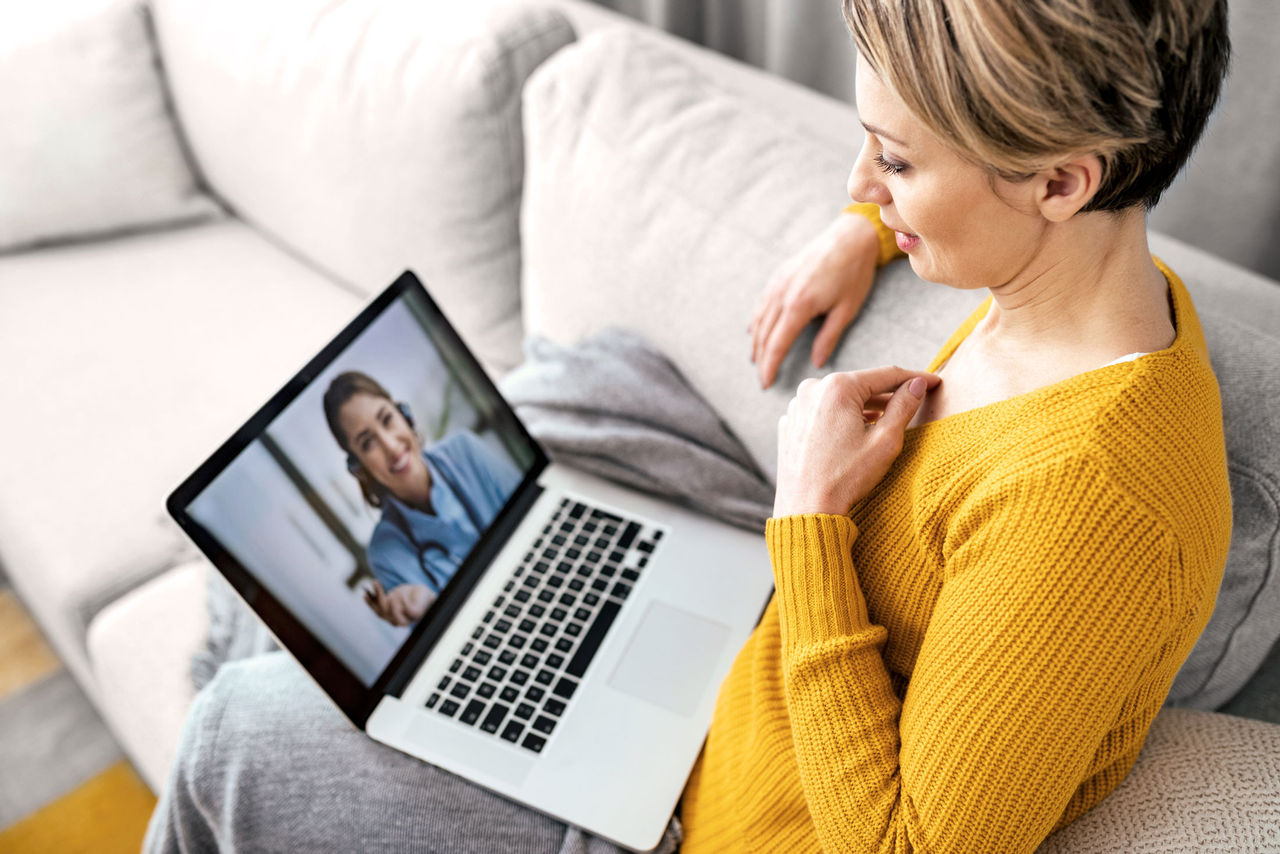 pharmacist compares three boxes of medication